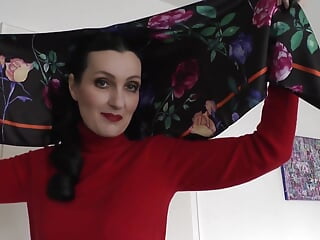 Lady Victoria Valente Showed Elegant Satin Headscarves with a Red Cashmere Turtleneck Sweater