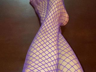 Really sexy legs with tiny feet with long toes in Purple fishnet stocking